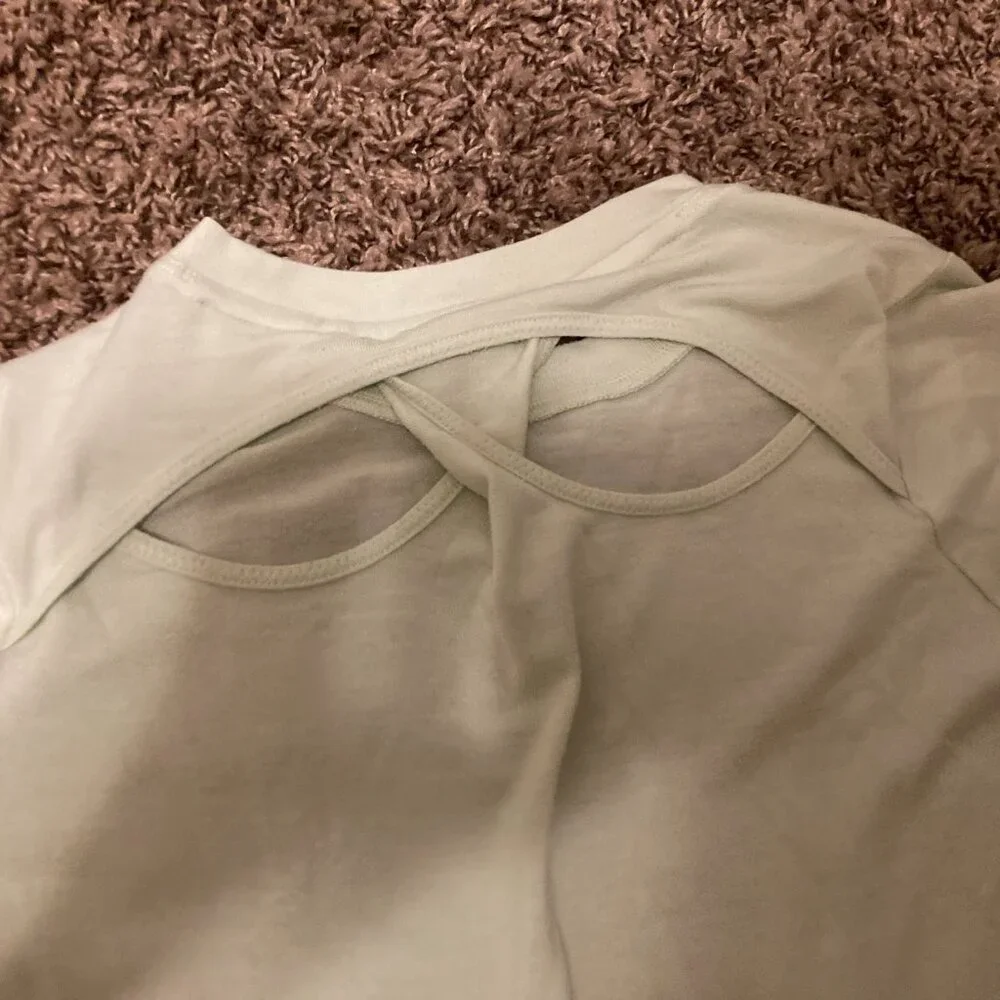 Athleta Girl Twist N Shout Tee Medium 8-10 Short Sleeve Light Green Cutout Back